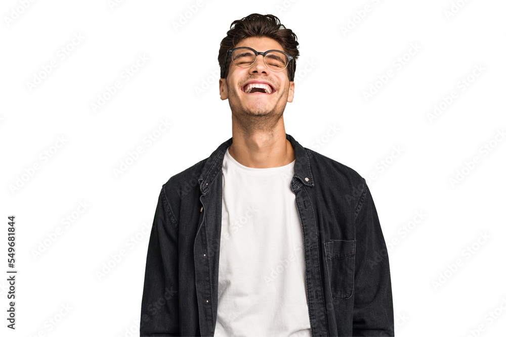 Young caucasian handsome man isolated relaxed and happy laughing, neck stretched showing teeth. Young caucasian handsome man isolated relaxed and happy laughing, neck stretched showing teeth.