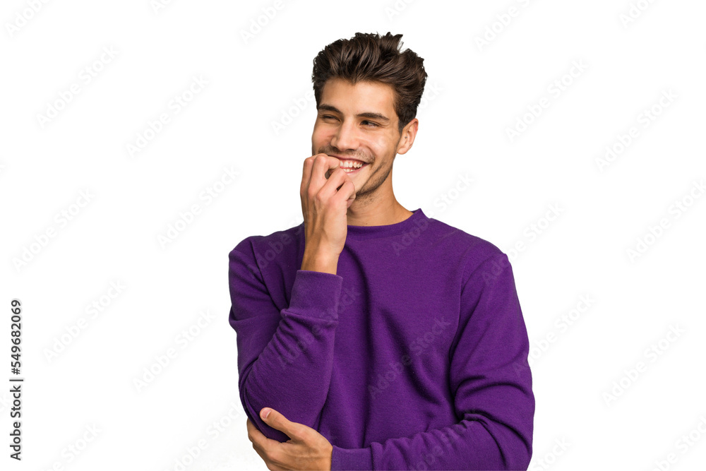 Young caucasian handsome man isolated relaxed thinking about something looking at a copy space. Young caucasian handsome man isolated relaxed thinking about something looking at a copy space.