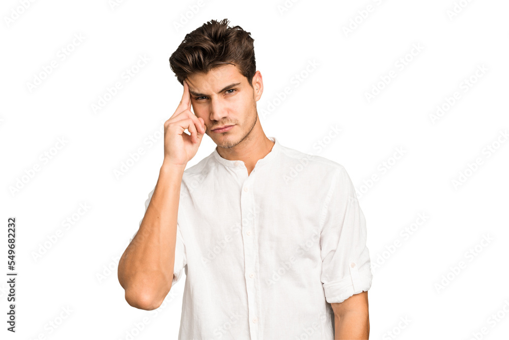 Young caucasian handsome man isolated pointing temple with finger, thinking, focused on a task. Young caucasian handsome man isolated pointing temple with finger, thinking, focused on a task.