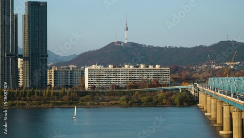 Zooming from N Seoul Tower to Dongjak Bridge Over Han River in Autumn, South Korea - Slow  Revealing Zoom Out Scenic Landscape photo