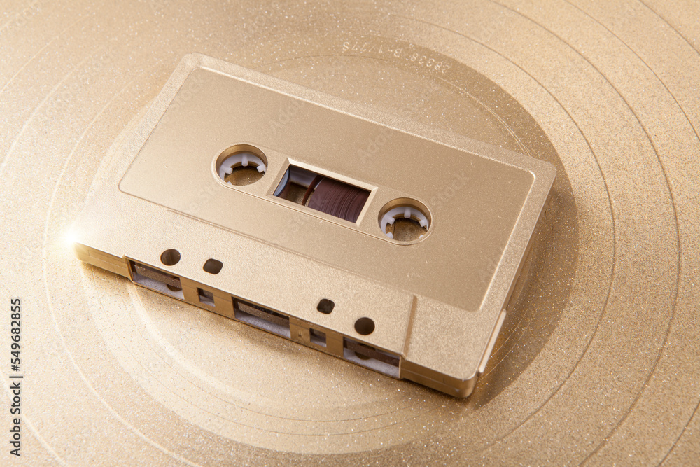 Obraz premium Cassette tape on vinyl record