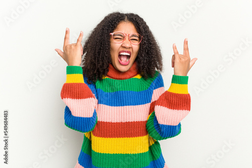 Canvastavla Young african american woman isolated on white background showing a horns gesture as a revolution concept