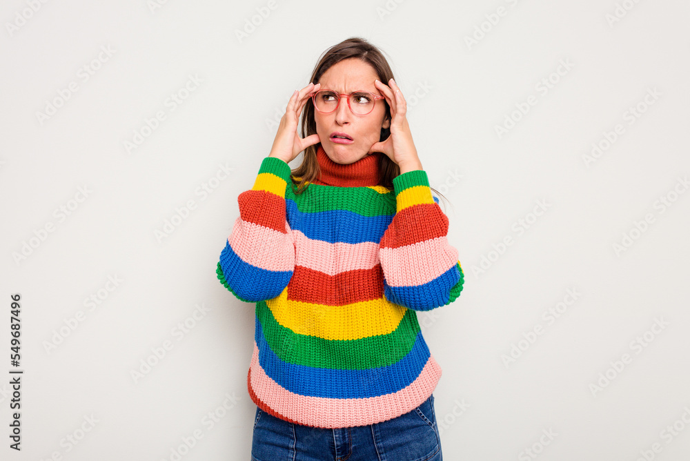 Young caucasian cute woman isolated on white background having a head ache, touching front of the face. Young caucasian cute woman isolated on white background having a head ache, touching front of the face.
