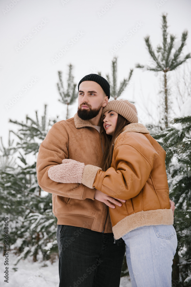 Couple in love are hugging in winter. Close up. Couple in love are hugging in winter. Close up.
