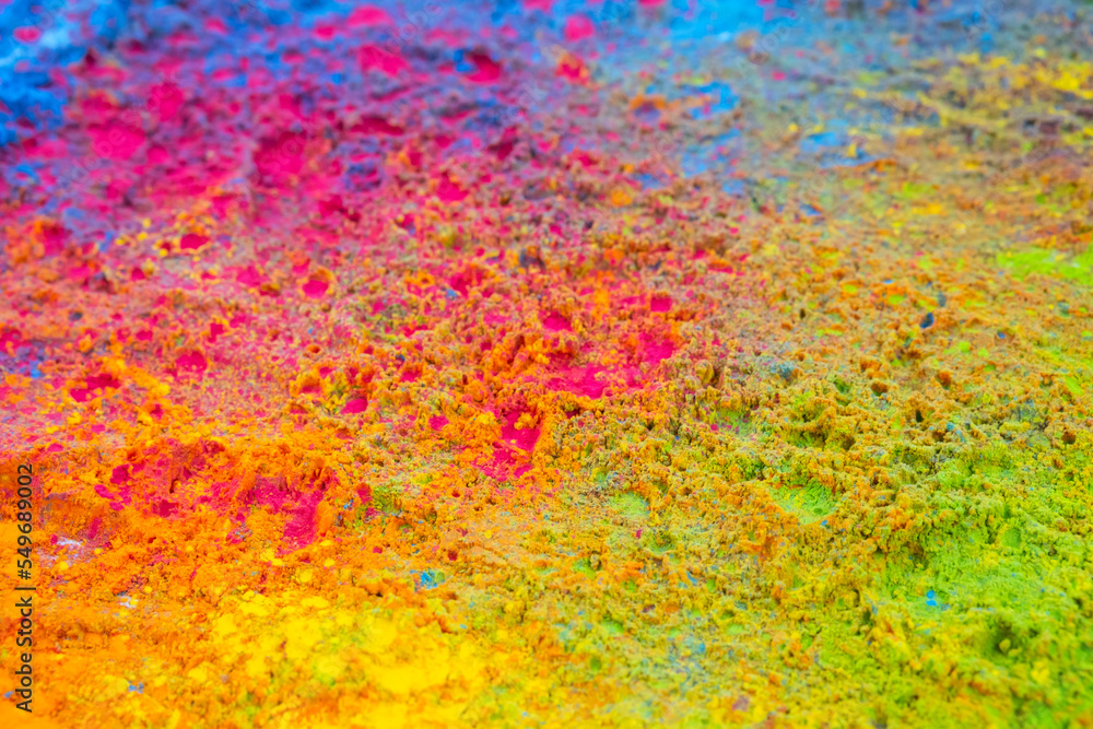 Holi coloured powder background. Traditional holi paint texture.