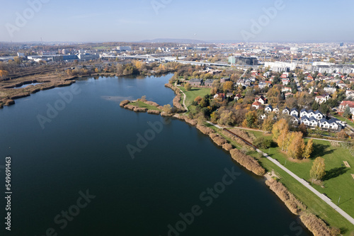 Aerial view - Bagry Lagoon, Podgórze XIII, Kraków, Poland - swimming spot in a city centre (kayak, sailing, sunbathing) Cracow must visit