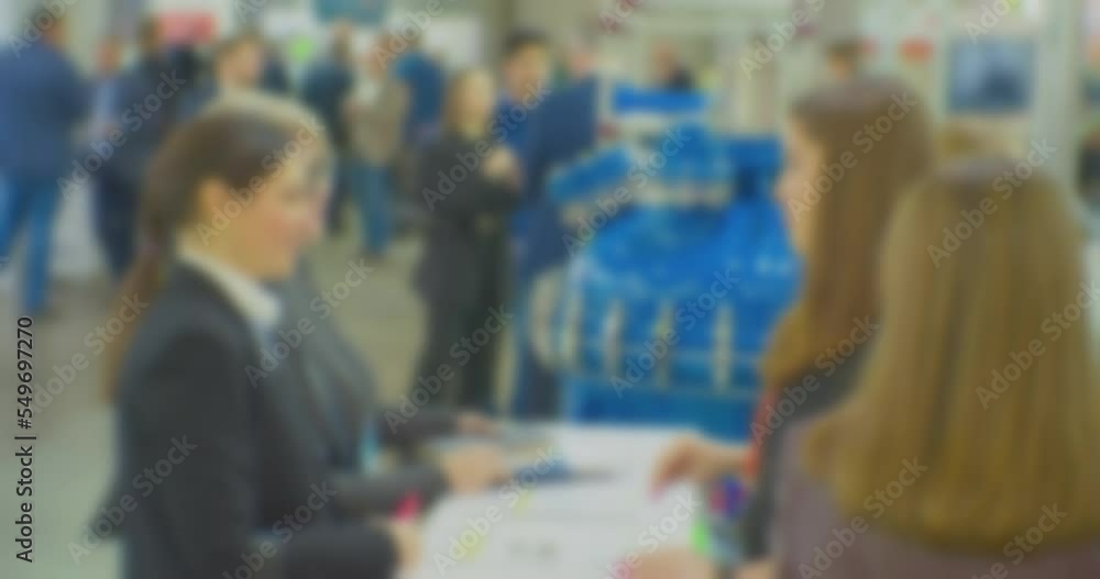 blurred silhouettes of unrecognizable people who communicate at a business meeting. blurred silhouettes of unrecognizable people who communicate at a business meeting.