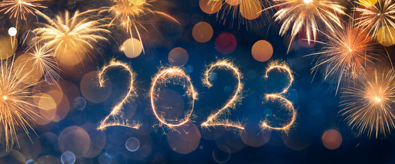2023 New Year Celebration With Sparkler And Fireworks At Blue Eve Night In Abstract Defocused Lights