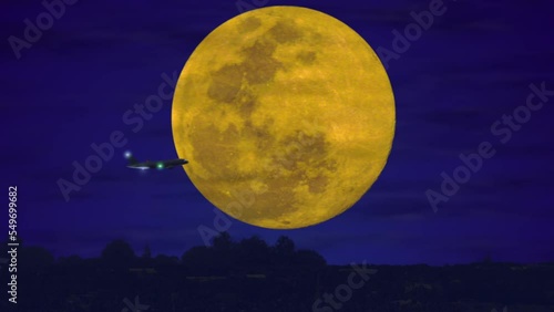 Airplane in front of full moon light at night (4K).
Animation of plane with full moon rising as background at night. 
Full 4K animation and composit.