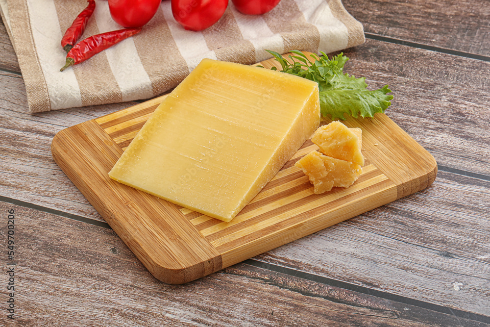 Parmesan hard cheese with small pieces Parmesan hard cheese with small pieces
