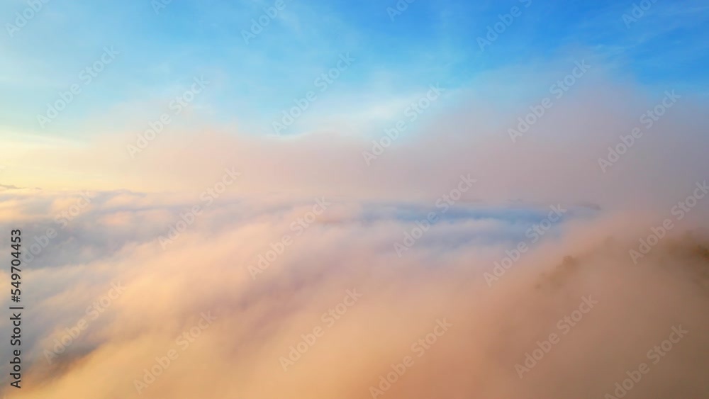 Drone flying over heavy dense fog during sunrise, Mountain scenery and sky in the background. amazing scenery in golden hour. Mae Hong Son Province, Northern Thailand. nature and travel concept. 4K
Drone flying over heavy dense fog during sunrise, Mountain scenery and sky in the background. amazing scenery in golden hour. Mae Hong Son Province, Northern Thailand. nature and travel concept. 4K