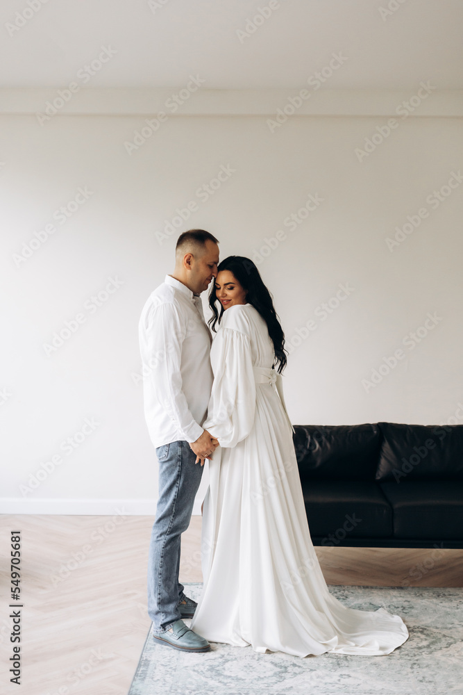 Happy family expecting a baby, concept of support and care Happy family expecting a baby, concept of support and care