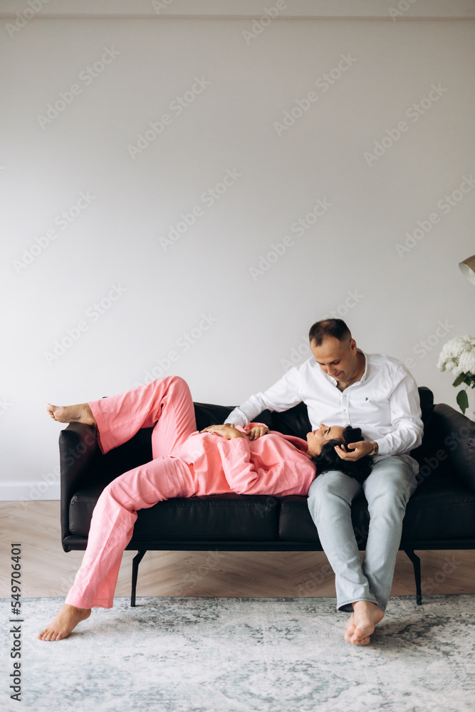 Happy family expecting a baby, concept of support and care Happy family expecting a baby, concept of support and care