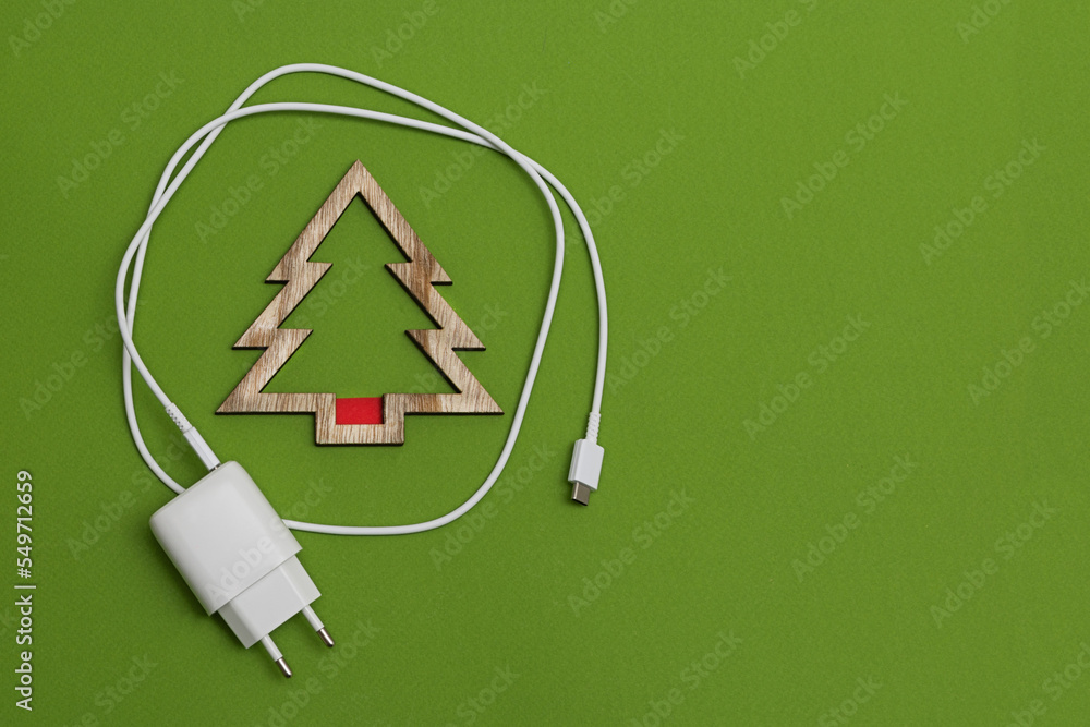 On A Green Background A Cell Phone Charger And A Christmas Tree In The infomighty-top-5-cell-phones-for-seniors