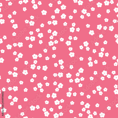 Cute floral pattern. Seamless vector texture. An elegant template for fashionable prints. Print with small white flowers . pink background.