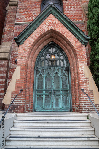 Church entrance with motion blur on the edges. High quality photo processed to show motion blur indicating being drawn into a church door.