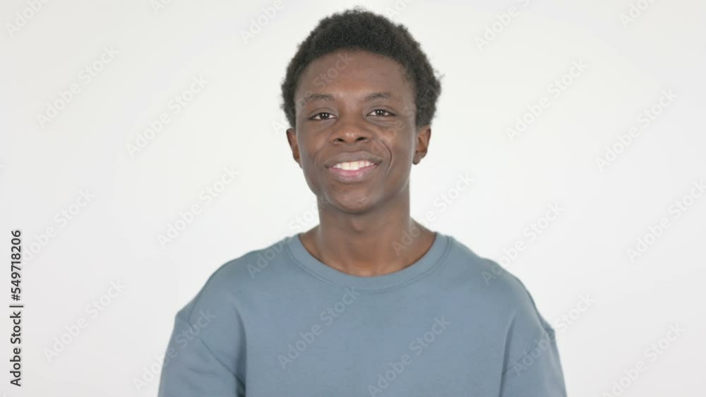 Young African Man Showing Red Heart on White Background Young African Man Showing Red Heart on White Background