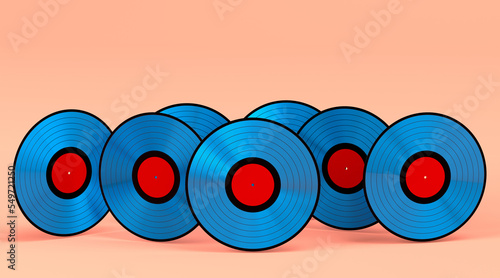 Set of vinyl LP records with label isolated on coral background.
