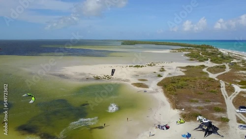 Wallpaper Mural Kitesurfing in turquoise water of tropical beach paradise in warm waters at bright sunny day. Aerial view Torontodigital.ca