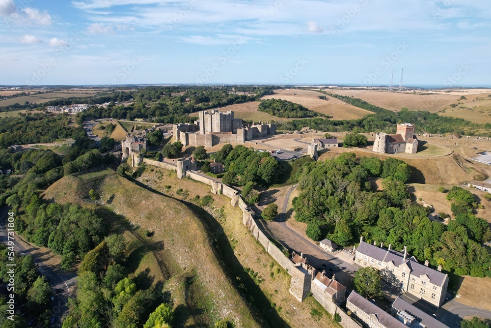 Dover Castle Kent England dramatic aerial drone view of medieval fortifications .