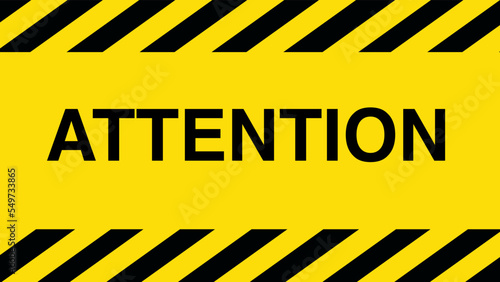 under construction sign attention on hazard stripes yellow and black background