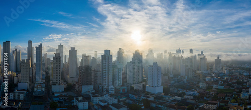 Panoramic aerial view of mist covering the city of Bal. Camboriú early morning, Brazil. photo