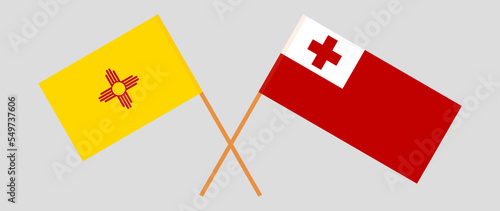 Crossed flags of the State of New Mexico and Tonga. Official colors. Correct proportion