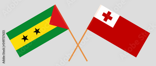 Crossed flags of Sao Tome and Principe and Tonga. Official colors. Correct proportion