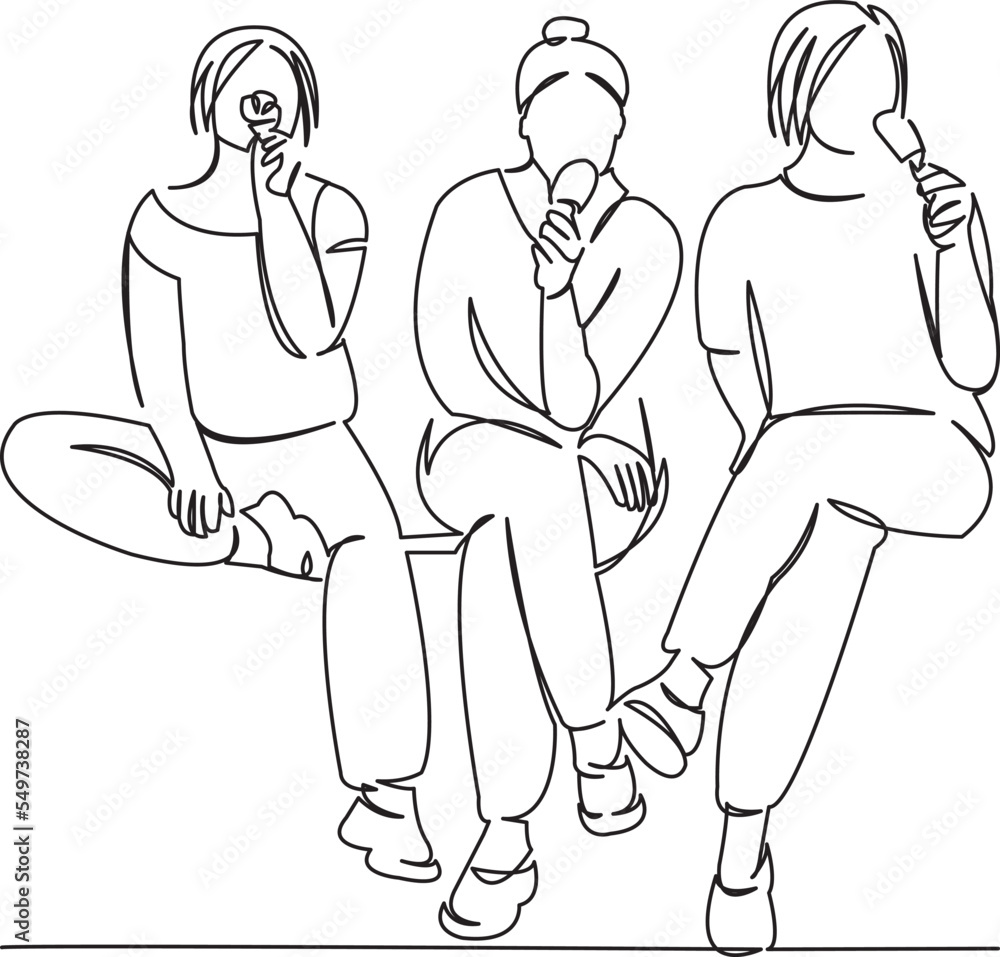 Fototapeta premium three girls eating ice cream