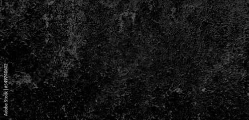 Black cement concrete wall background texture with cracks to show visible mysterious background.