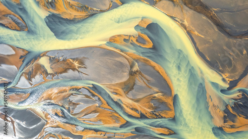 Aerial view of abstract water formation near Olfusa river bank in Iceland. photo