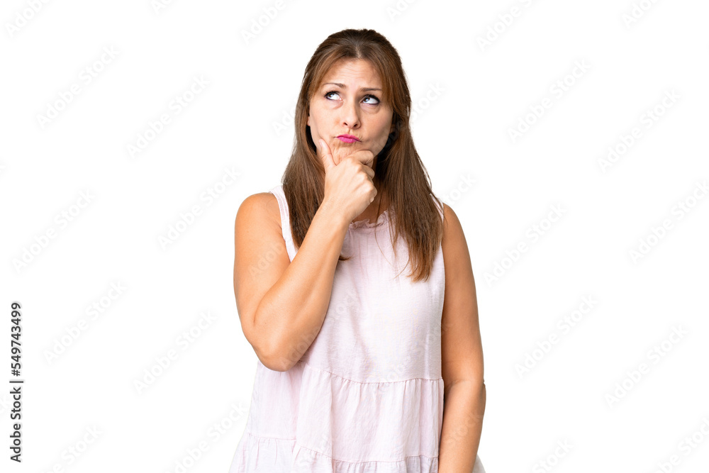 Middle age woman over isolated background having doubts and with confuse face expression Middle age woman over isolated background having doubts and with confuse face expression