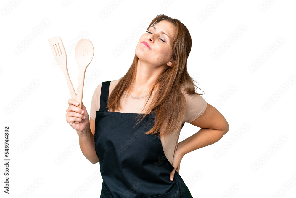 Middle age caucasian woman holding a rolling pin over isolated background suffering from backache for having made an effort Middle age caucasian woman holding a rolling pin over isolated background suffering from backache for having made an effort