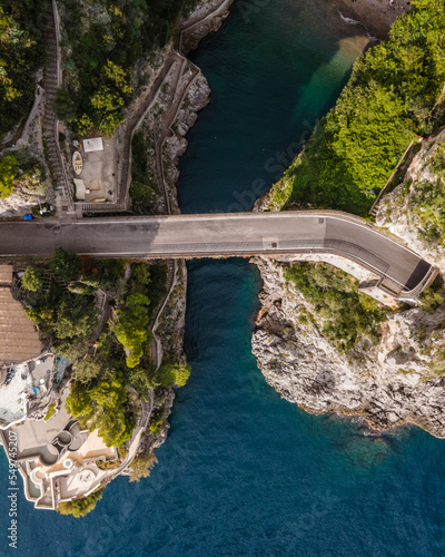 Aerial view of a bridge crossing the fjord in Furore, a small town along the Amalfi Coast, Salerno, Campania, Italy.