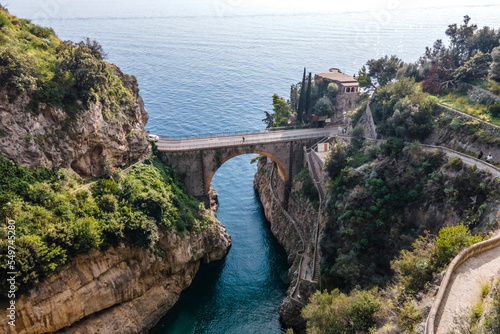 Aerial view of a bridge crossing the fjord in Furore, a small town along the Amalfi Coast, Salerno, Campania, Italy.