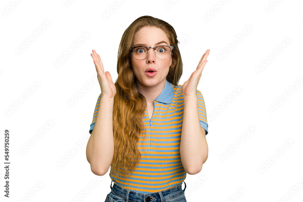 Young caucasian redhead woman isolated surprised and shocked. Young caucasian redhead woman isolated surprised and shocked.