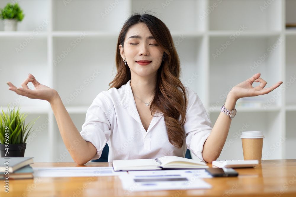 Stressful business woman meditating and solving problems. Stressful business woman meditating and solving problems.