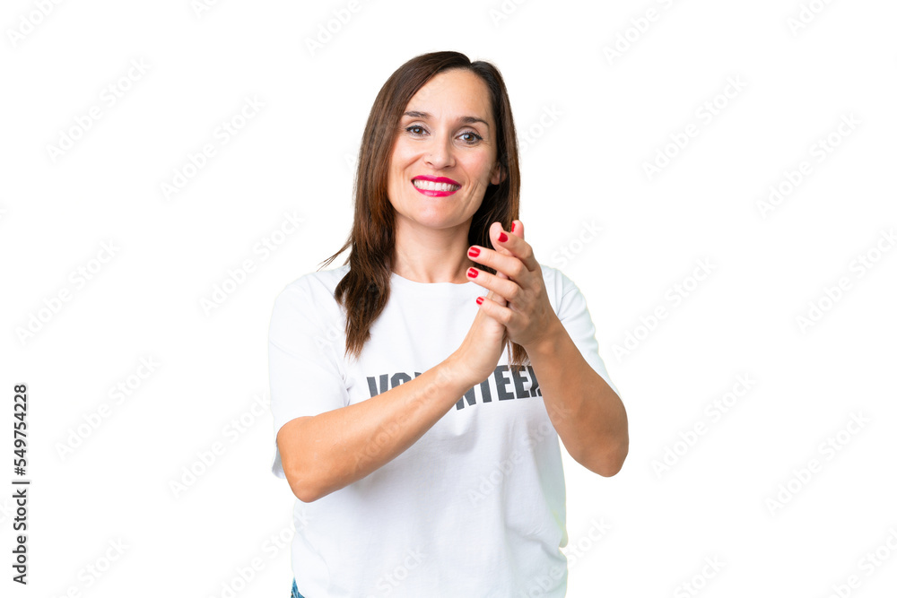 Middle age volunteer woman over isolated chroma key background applauding after presentation in a conference Middle age volunteer woman over isolated chroma key background applauding after presentation in a conference