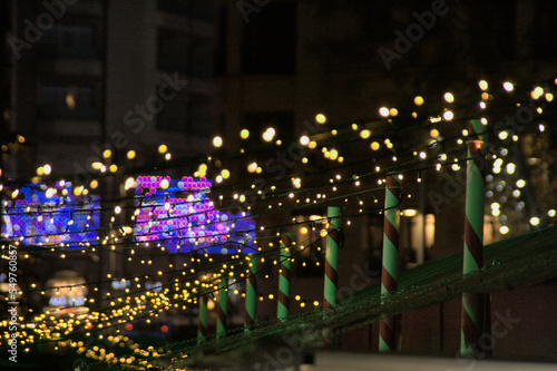 Christmas golden light bokeh decoration background © CarlosPS