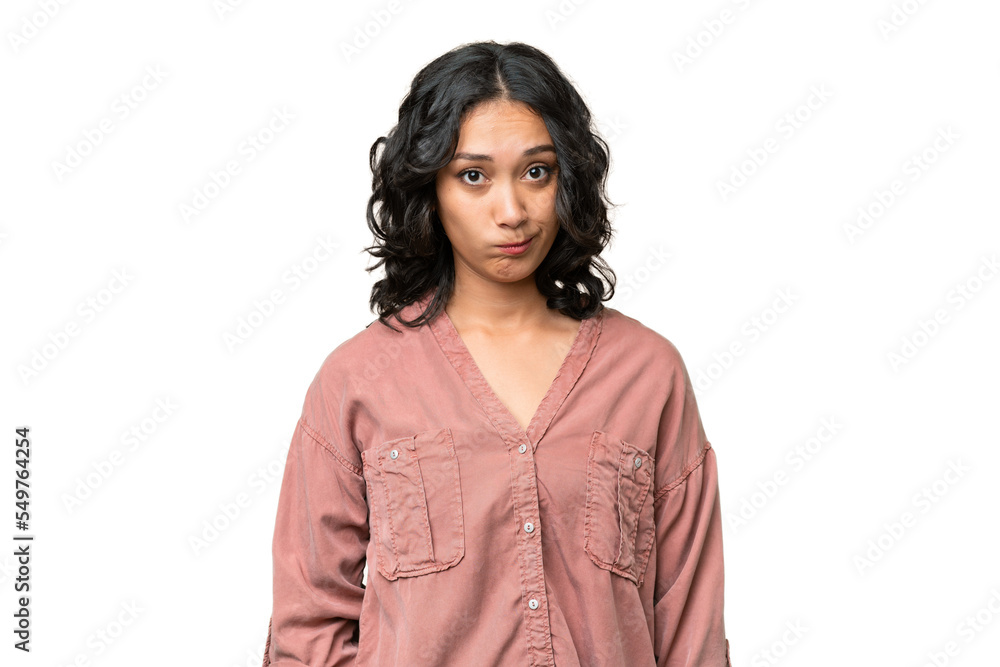 Young Argentinian woman over isolated background with sad expression Young Argentinian woman over isolated background with sad expression
