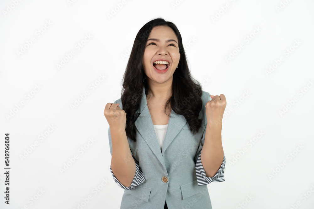 Excited young asian woman with raised hand celebrating success Portrait cheerful positive asian female with raised hands and fists open mouth Girl get happy enjoy life white background copy space. Excited young asian woman with raised hand celebrating success Portrait cheerful positive asian female with raised hands and fists open mouth Girl get happy enjoy life white background copy space.