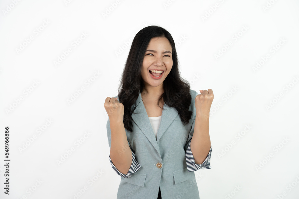 Excited young asian woman with raised hand celebrating success Portrait cheerful positive asian female with raised hands and fists open mouth Girl get happy enjoy life white background copy space. Excited young asian woman with raised hand celebrating success Portrait cheerful positive asian female with raised hands and fists open mouth Girl get happy enjoy life white background copy space.