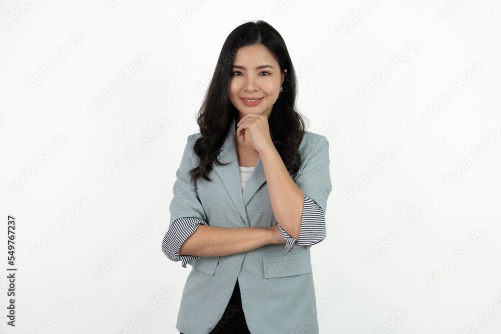 Young asian business woman smiling to camera standing pose on isolated white background. Young asian business woman smiling to camera standing pose on isolated white background.
