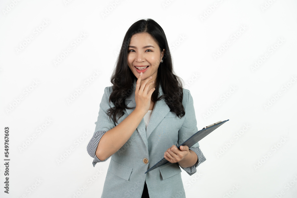 Portrait happy beautiful young asian business woman long hair standing and holding clipboard with looking to camera and smile over white background. Portrait happy beautiful young asian business woman long hair standing and holding clipboard with looking to camera and smile over white background.