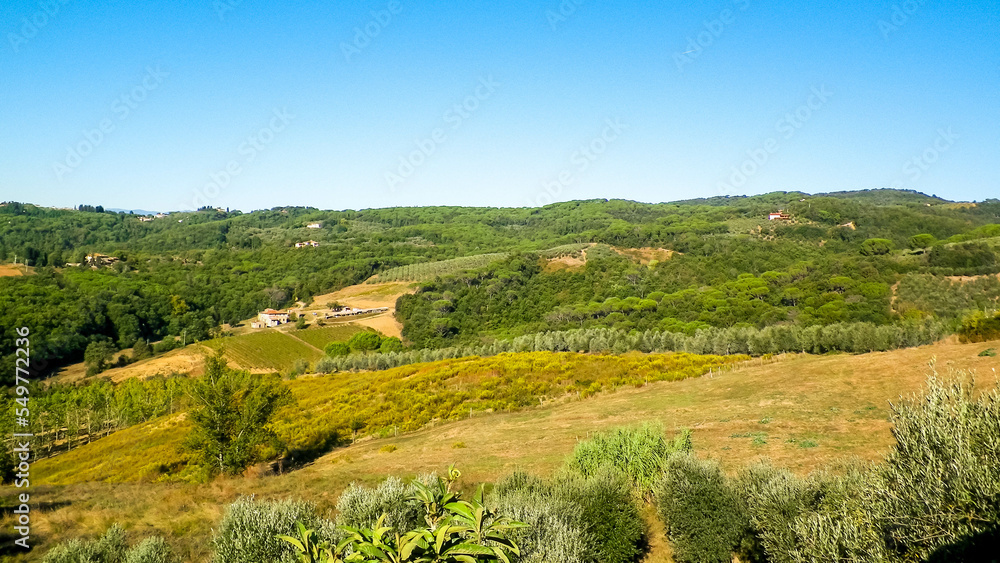 Hills, fields and meadows - typical views of Tuscany, Italy.