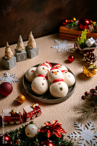 Chinese Steamed Buns or Mantou with christmas decoration photo