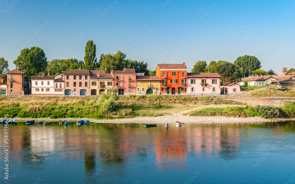 Colored houses along the south bank of river Ticino in Pavia in northern Italy