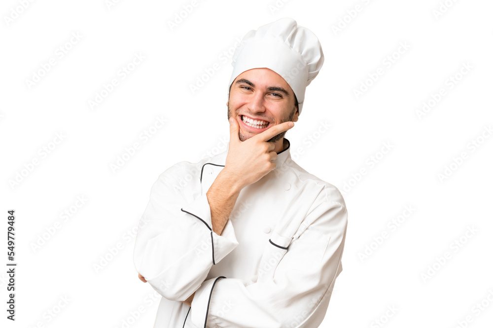 Young handsome chef man over isolated background smiling Young handsome chef man over isolated background smiling