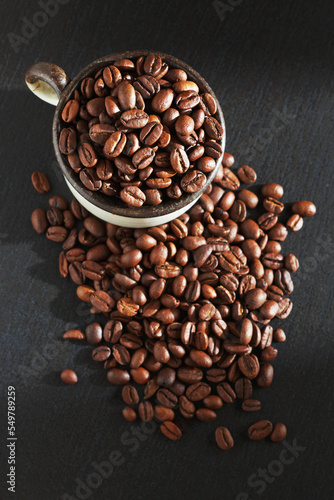 Coffee beans in cup © Sasajo