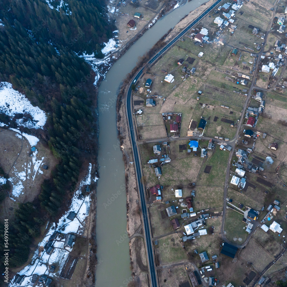 Naklejka premium Top view of a mountain village of Ukraine in winter.